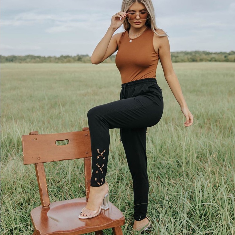 Kittenish black pants with leopard strings